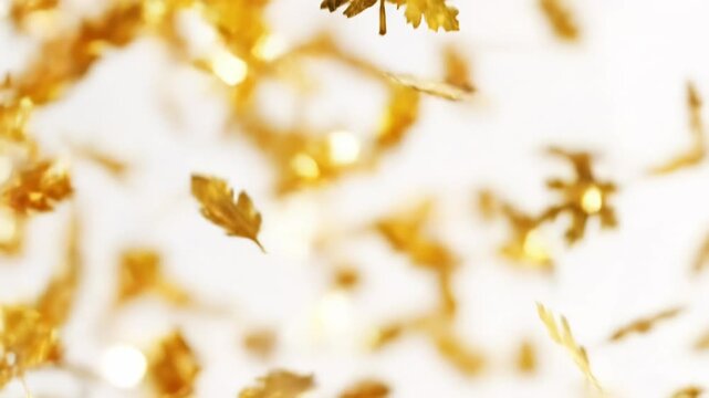 Falling golden oak leaf confetti or glitter isolated on white background, perfect for festive decoration or abstract autumn theme