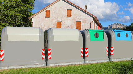 four large bins for separate collection uraban solid waste city street