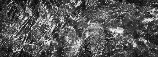 black and white image of flowing water