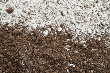 dolomite flour is scattered on the surface of the arable land
