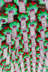 Notes hanging from temple roof