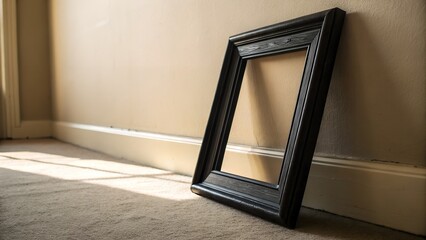 Simple black picture frame leaning against a white wall in a bright modern room with wooden floor, AI generated