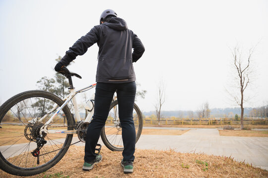 Woman freerider riding bike outdoors