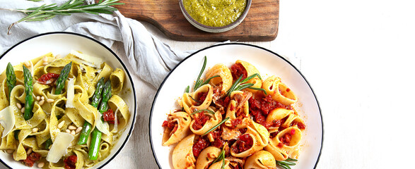 Italian dinner table with assortment of pastas.