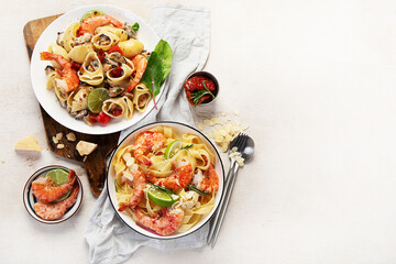 Delicious pastas with red shrimps and mussels, italian pastas, mediterranean recipe.