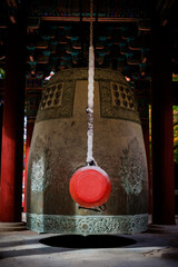 Huge bell with Red wooden mallet