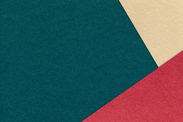 Abstract dark teal, red, light beige paper background with copy space. Template for presentation, banner, card design