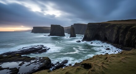 Dramatic coastal landscape with rugged cliffs.