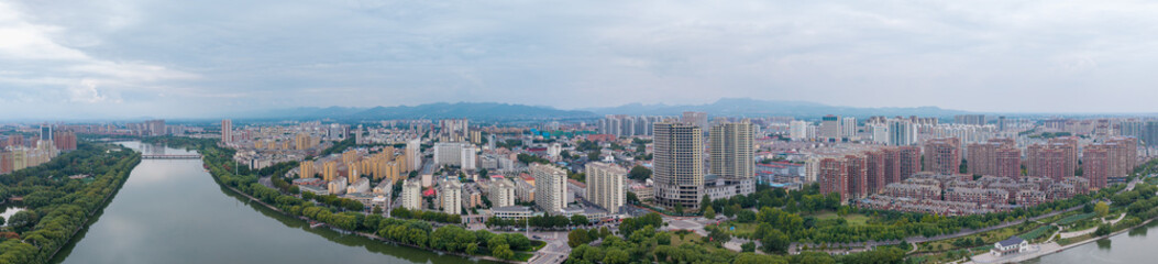 Naklejka premium China Linqu urban architecture and river landscape