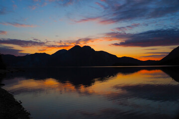 Walchensee, often called the “Caribbean of Bavaria,” known for its striking turquoise water and dramatic alpine setting. Surrounded by steep mountain  © SchwarzfischerMiriam