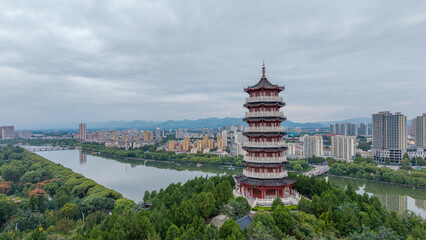 China Linqu ancient tower and urban garden architecture river landscape