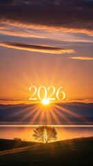 Sunset over a tranquil landscape with a glowing 2026 emblem above a silhouetted tree.