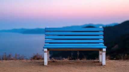 Blue Monday Vibrant blue wooden bench centered on a scenic hilltop view during a beautiful colorful twilight