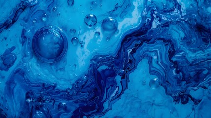 abstract liquid pattern in blue tones with marbled textures and floating bubbles that provides a calm, flowing background for both commercial and artistic design. A beautiful macro image