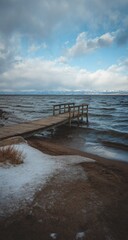Wooden pier on a wintry lake