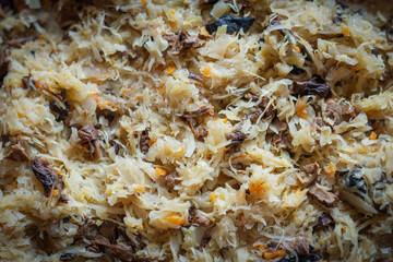 Delicious blend of sauerkraut, mushrooms, and carrots prepared as a filling for Christmas dumplings