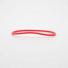 Naklejka premium Red rubber band isolated on white background generative ai