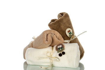 Soft pleasant towel, isolated on white background, close-up.