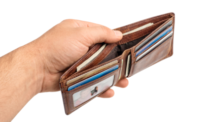 Male hand holding open brown leather wallet full of money and credit cards isolated on transparent background