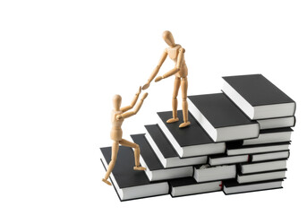 Polished wooden artist mannequins, one assists another climbing black books with white edges in bright white studio, copy space. Concept of educational guidance and progress