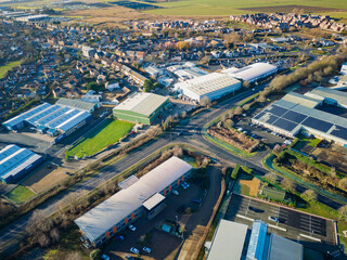 Interesting UAV view of modern industrial buildings seen on the outskirts of the town of Chatteris, Cambridgeshire, UK. The industrial zone is a large employer to the market town. © Nick Beer