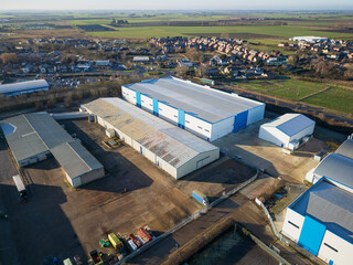 Interesting UAV view of modern industrial buildings seen on the outskirts of the town of Chatteris, Cambridgeshire, UK. The industrial zone is a large employer to the market town. © Nick Beer