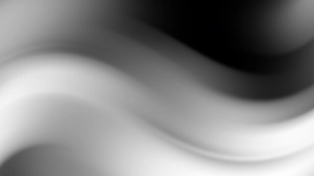 Abstract black and white waves in smooth gradient for impactful monochrome designs. Suitable for modern backgrounds, posters, and digital art.