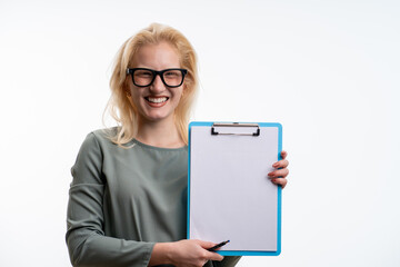 Smiling woman with AR glasses showing clipboard on isolated background