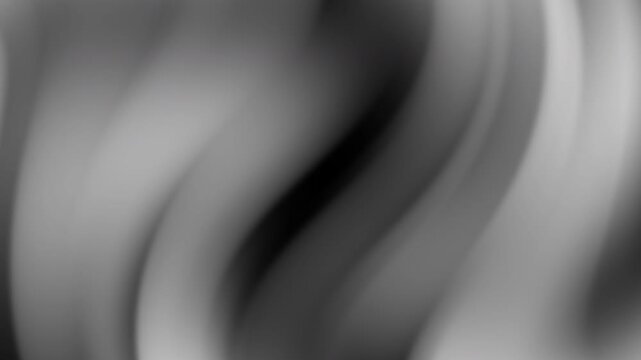 Black white gradient flows in blurred curves, creating elegant gray toned abstract imagery suitable for backgrounds or modern design projects.