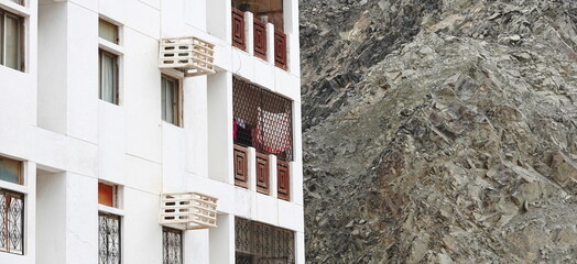 Urban Building Facade Minimal Sideview White. Mountain Rock Texture Gray