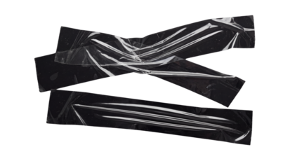 Three Wrinkled Black Plastic Electrical Tapes Isolated on White Background