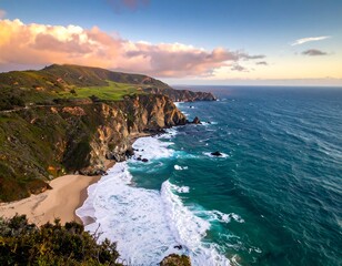 Coastal landscape showcases cliffs, ocean waves, and green hills under a sunset
