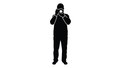 Silhouette of a photographer taking a picture with a camera