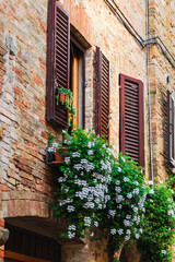 Obraz premium View of the architectural typology of the city of Pienza, in the province of Siena, Tuscany, Italy.