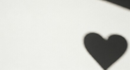 Heart shaped diamond on red velvet fabric with wide copy space for jewelry