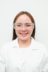 Portrait of Asian female research scientist against white background looking at camera smiling