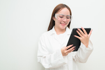 Portrait of Asian female research scientist against white background using digital tablet computer