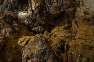Deep footpaths inside the Tham Chang Cave, Vang Vieng, Vientiane Province, Laos