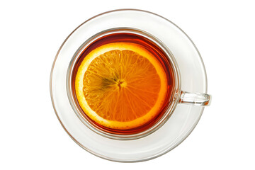 Warm tea with orange slice in clear glass cup on saucer