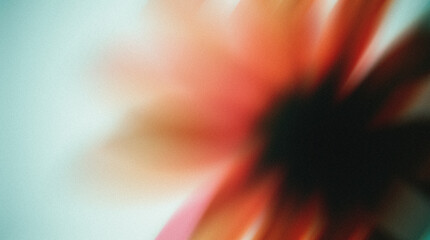 Abstract floral composition featuring blurred petals in vibrant hues, creating a sense of motion and energy, ideal for backgrounds or artistic projects with a focus on nature and beauty