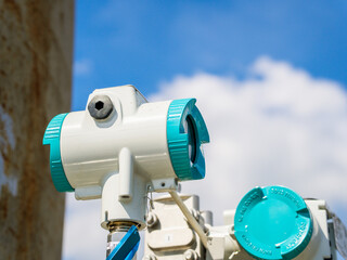 Factory workers air pollution reduction and emissions monitoring. Industrial development environmental monitoring. Eco friendly sustainable manufacturing concepts. Exhaust pipe technology system 