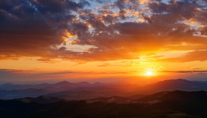 Warm Sunset Light Fills The Sky Illuminating Soft Clouds Distant Hills And A Horizon Aglow With Golden Color