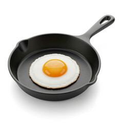 A fried egg cooking in a black cast iron skillet