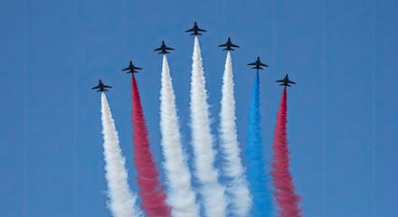 Precision Aerobatics Jet Planes in Perfect Formation Paint the Sky with Vibrant Red, White, and Blue Smoke Trails during a Dynamic Air Display