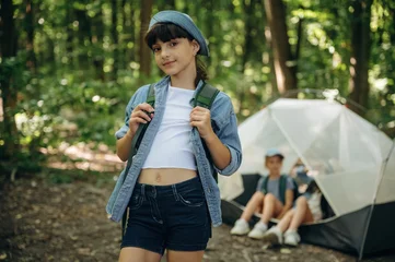 Fotobehang Diamanten By the tent. Girls kids are in the forest, hike conception  © standret