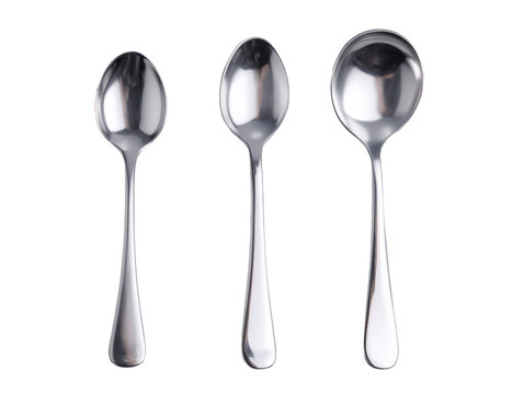 Assorted Stainless Steel Spoons on Grey Background 