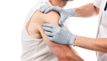 Softfocused image of healthcare professional examining axillary lymph nodes on partial torso of adult patient seated for immune recovery check in a clinical setting.