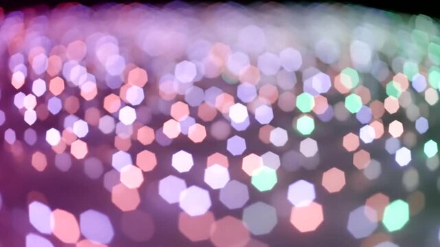 Colorful bokeh lights creating a vibrant atmosphere in a blurred background