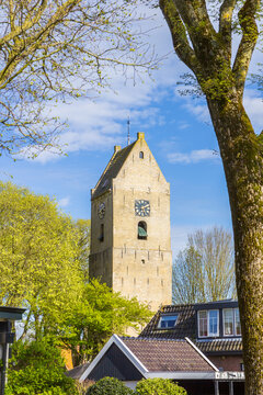 Historic church tower in the center of Nes, Ameland, Netherlands