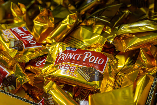 Prince Polo Mini Classic candies in gold wrappers displayed loose in retail cardboard box store shelf